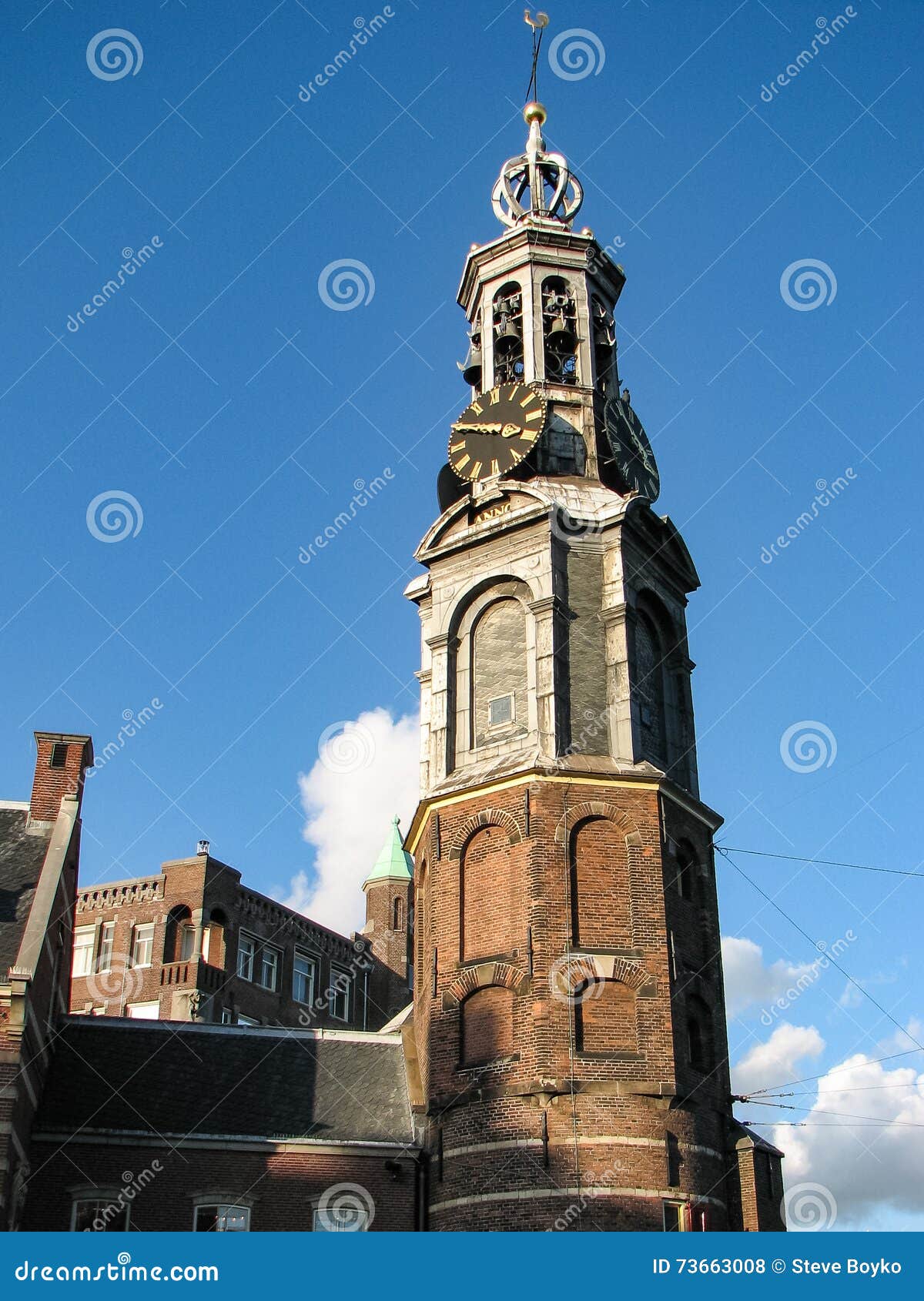 Clock Tower in Amsterdam stock photo. Image of blue, attraction 73663008