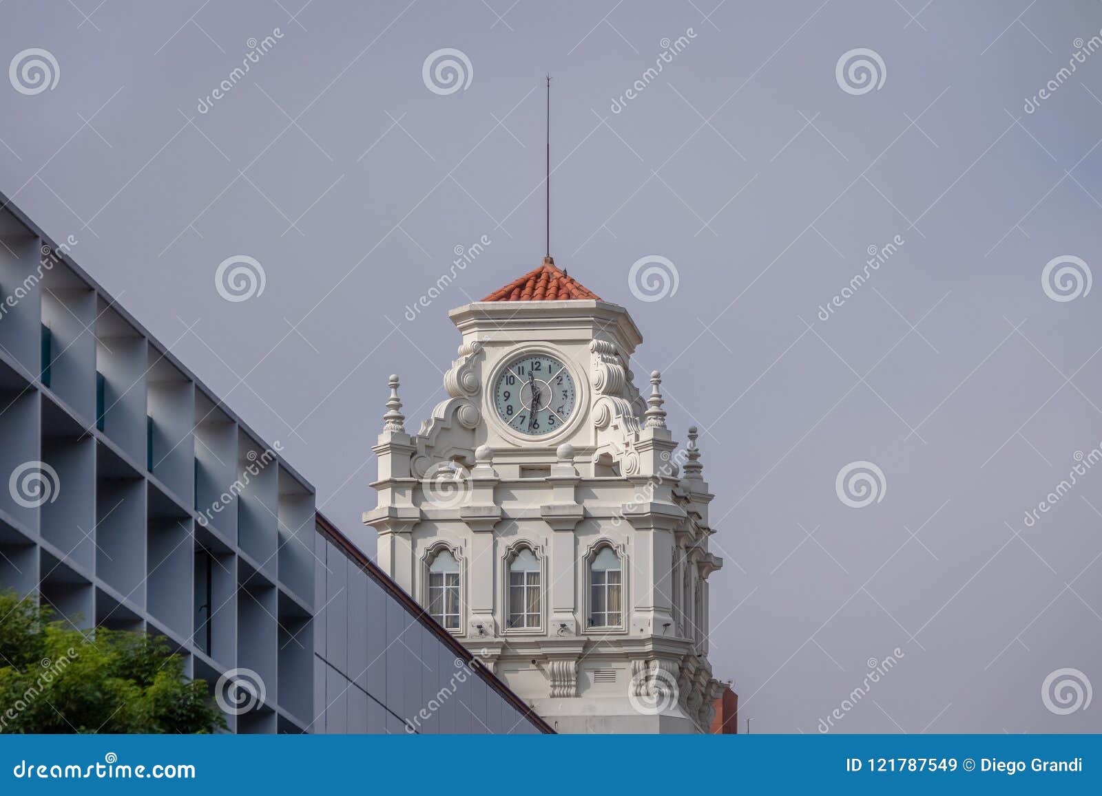 clock tower of building near plaza san martin at rivadavia and rosario de santa fe street corner - cordoba, argentina