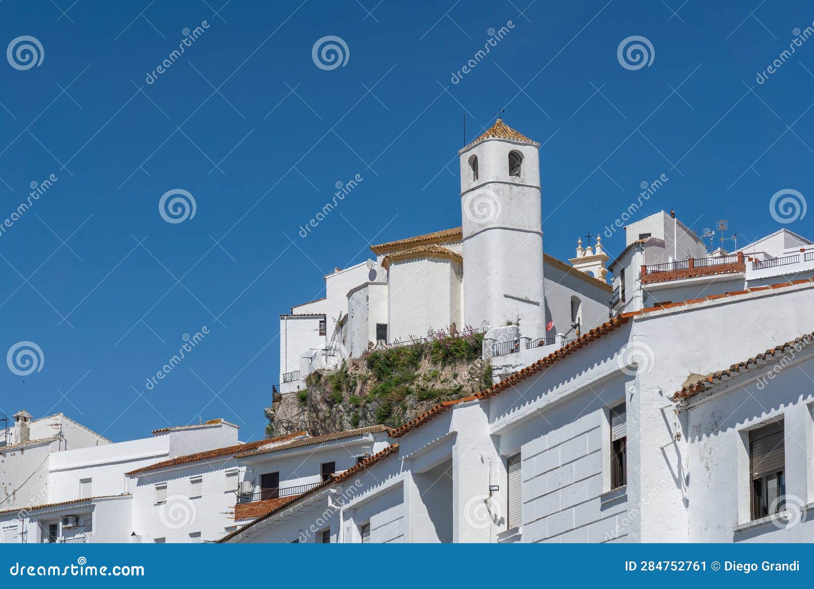 clock tower of chapel of san juan de letran - zahara de la sierra, andalusia, spain