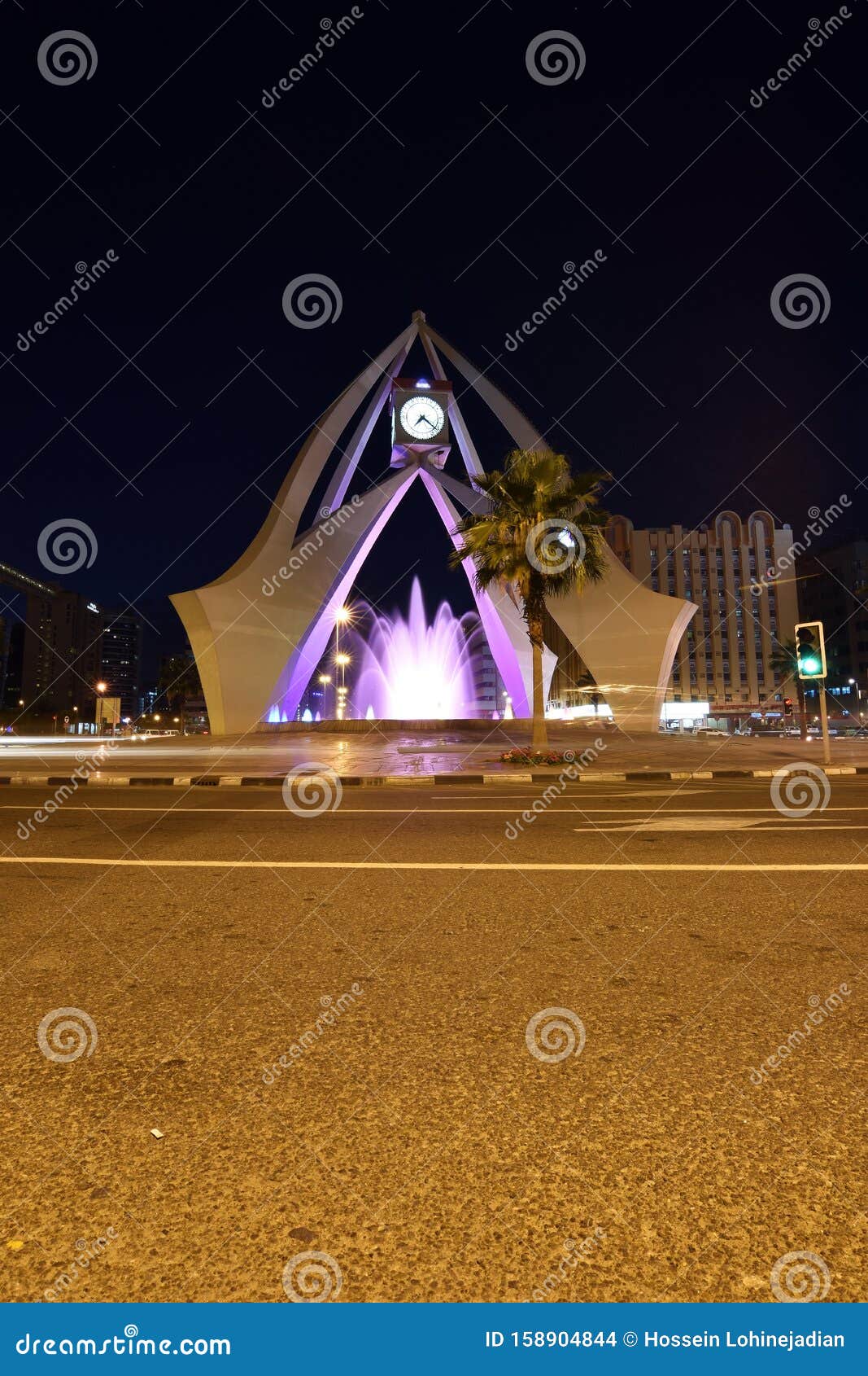 Clock tower dubai at night editorial stock image. Image of autos