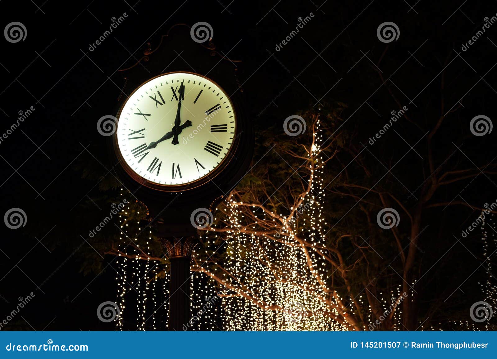Clock tower at night stock image. Image of background 145201507