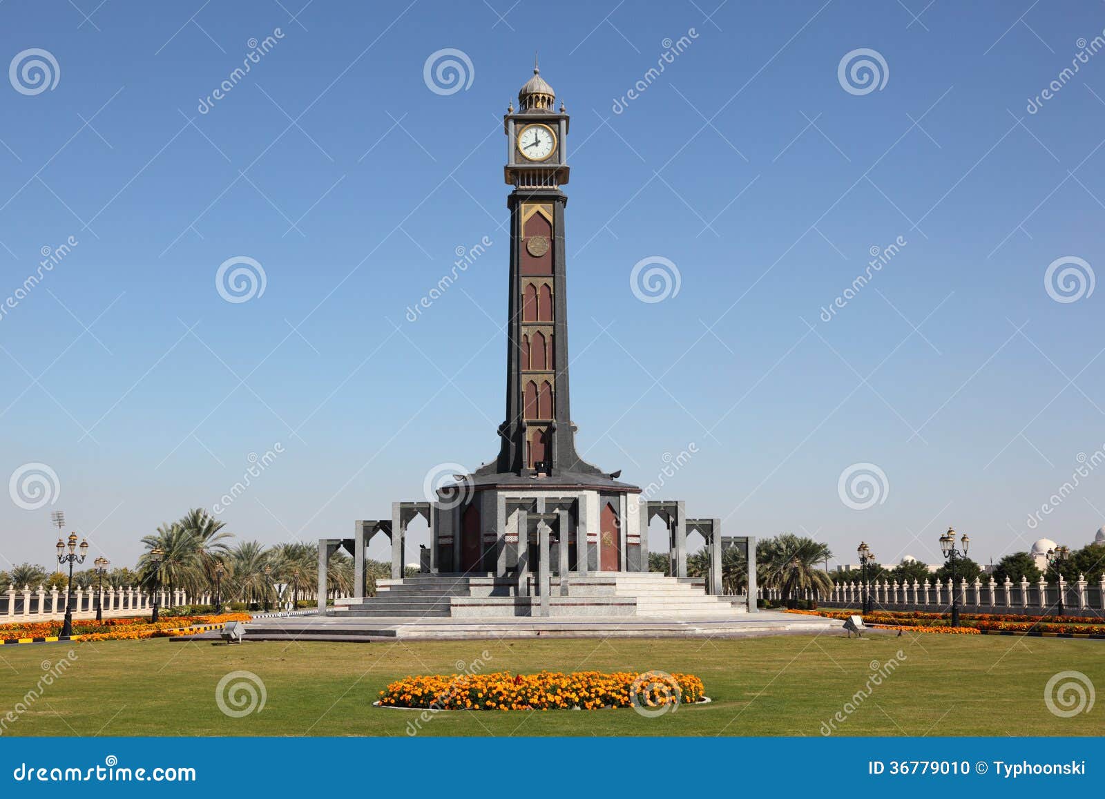 Clock tower in Sharjah stock photo. Image of column, arabia 36779010