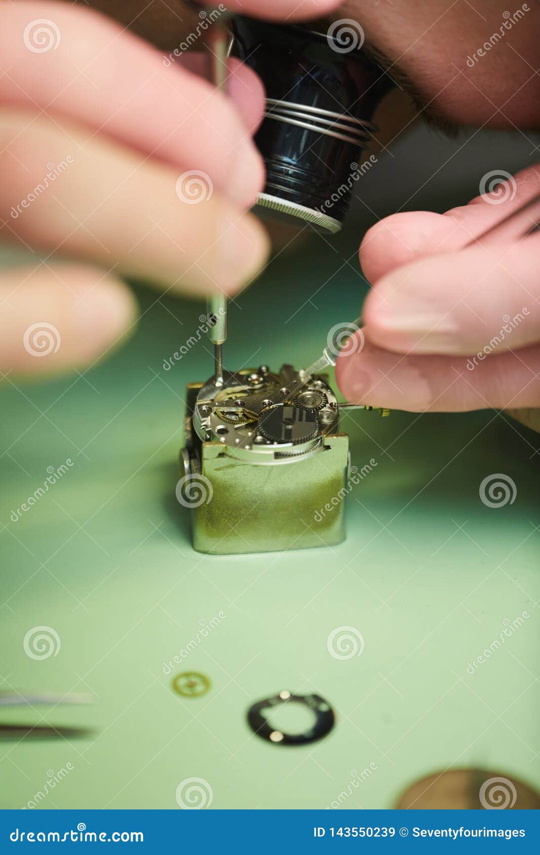 Clockmaker Repairing Watch stock image. Image of quality 143550239