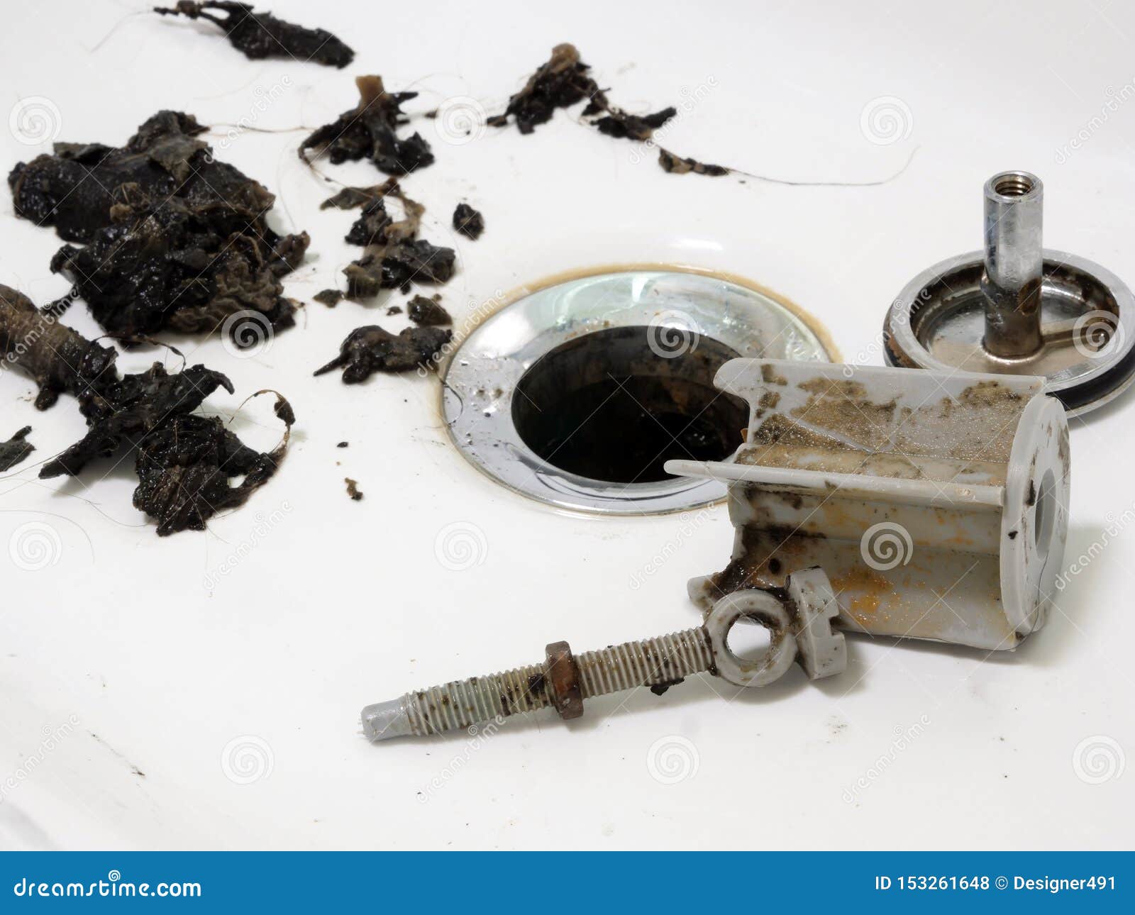 Clogged Sink In Bathroom And Pipe Cleaning Stock Photo