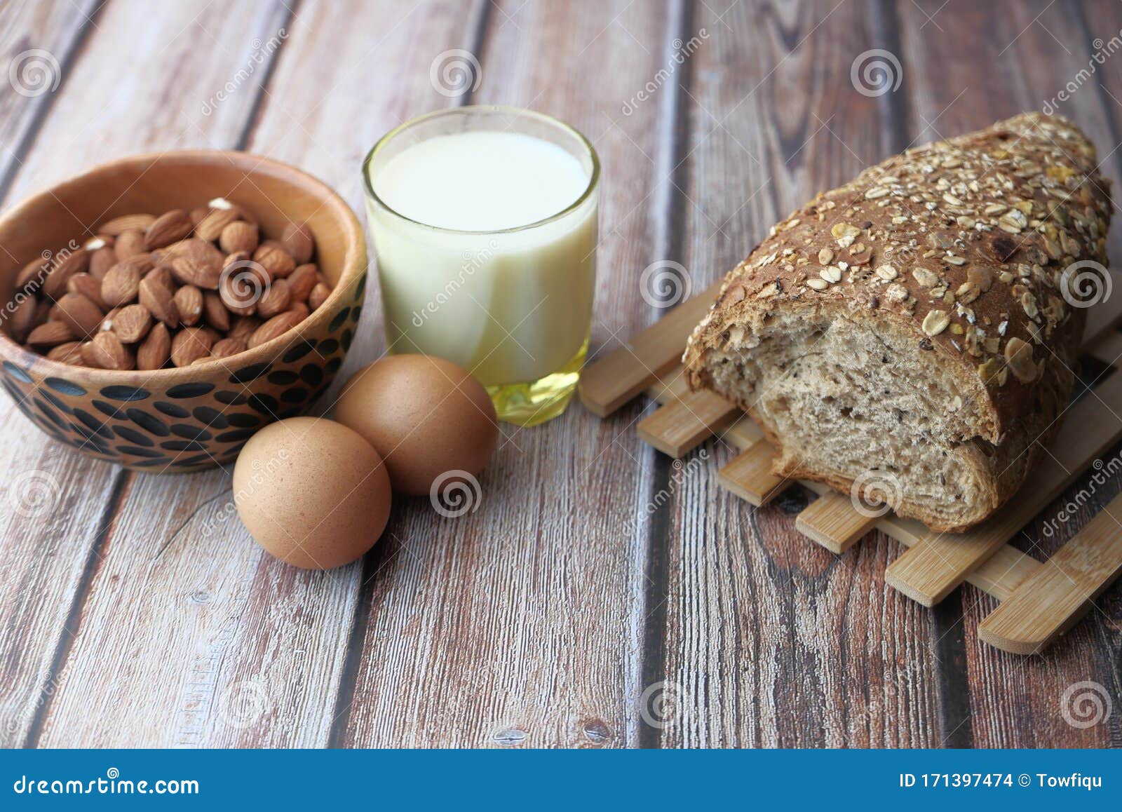 Close of Almond, Egg, Bread and Milk on Table Stock Photo Image of dairy, brie 171397474