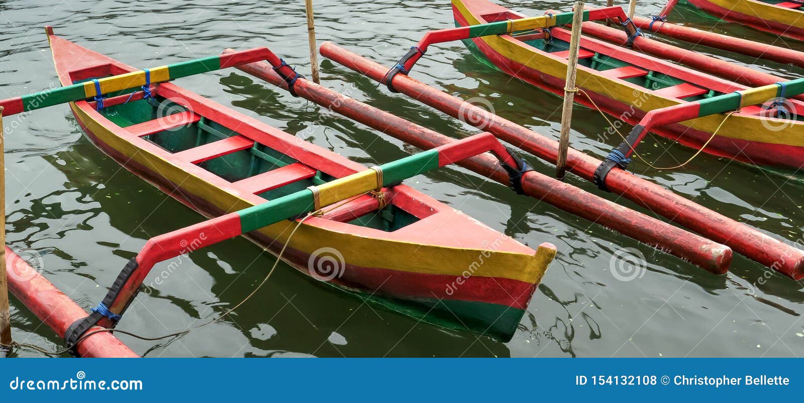 close of boats at ulun danu beratan temple beside lake beratan on bali