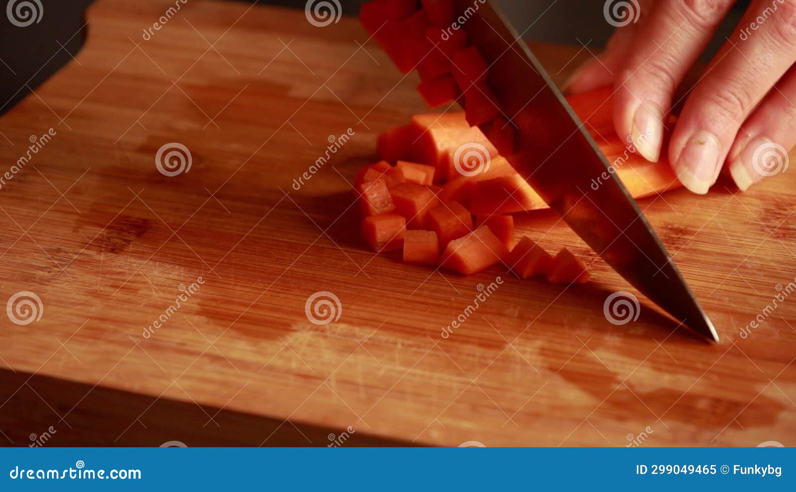 Close Footage of Expert Hands PrecisionCutting Carrots Stock Video