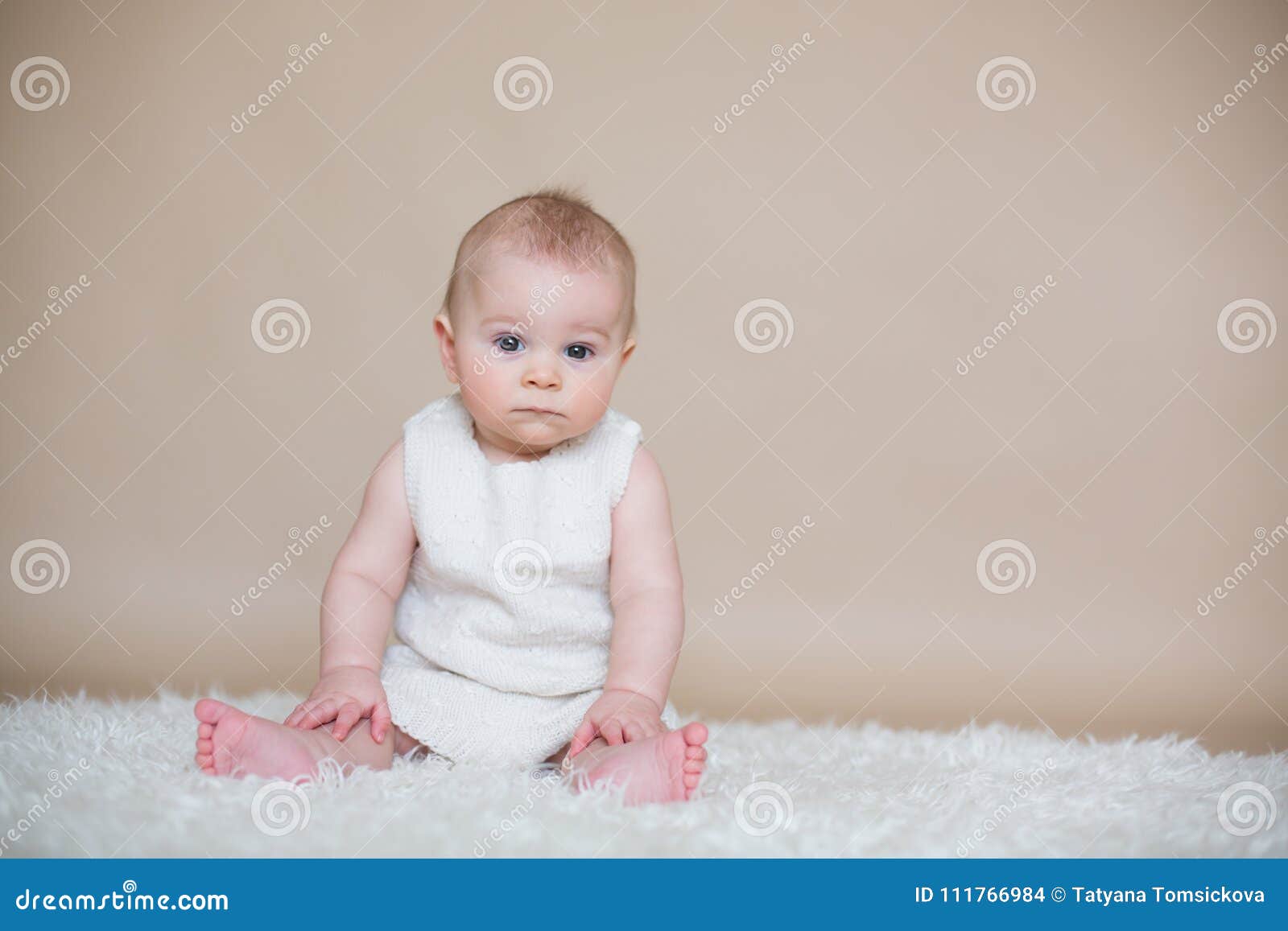 Close Portrait of Cute Little Baby Boy, on Beige Backgr Stock Photo ...