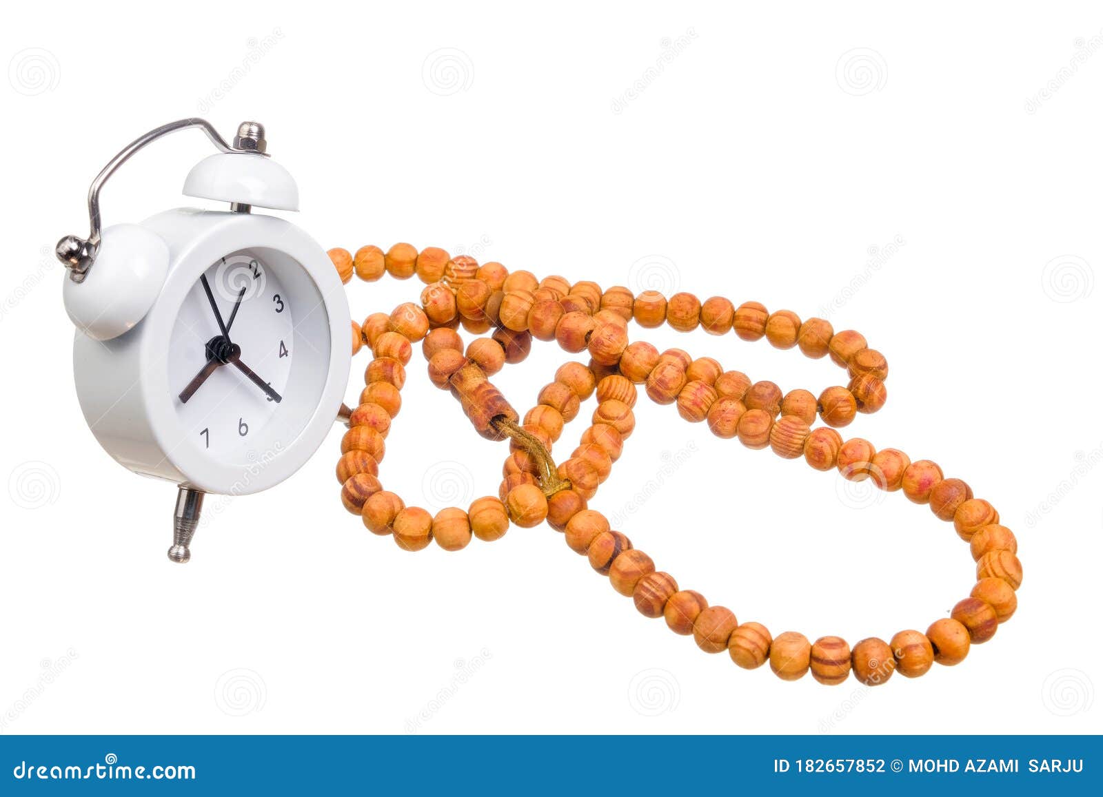 CloseUp of Alarm Clock and Prayer Beads Stock Photo Image of white