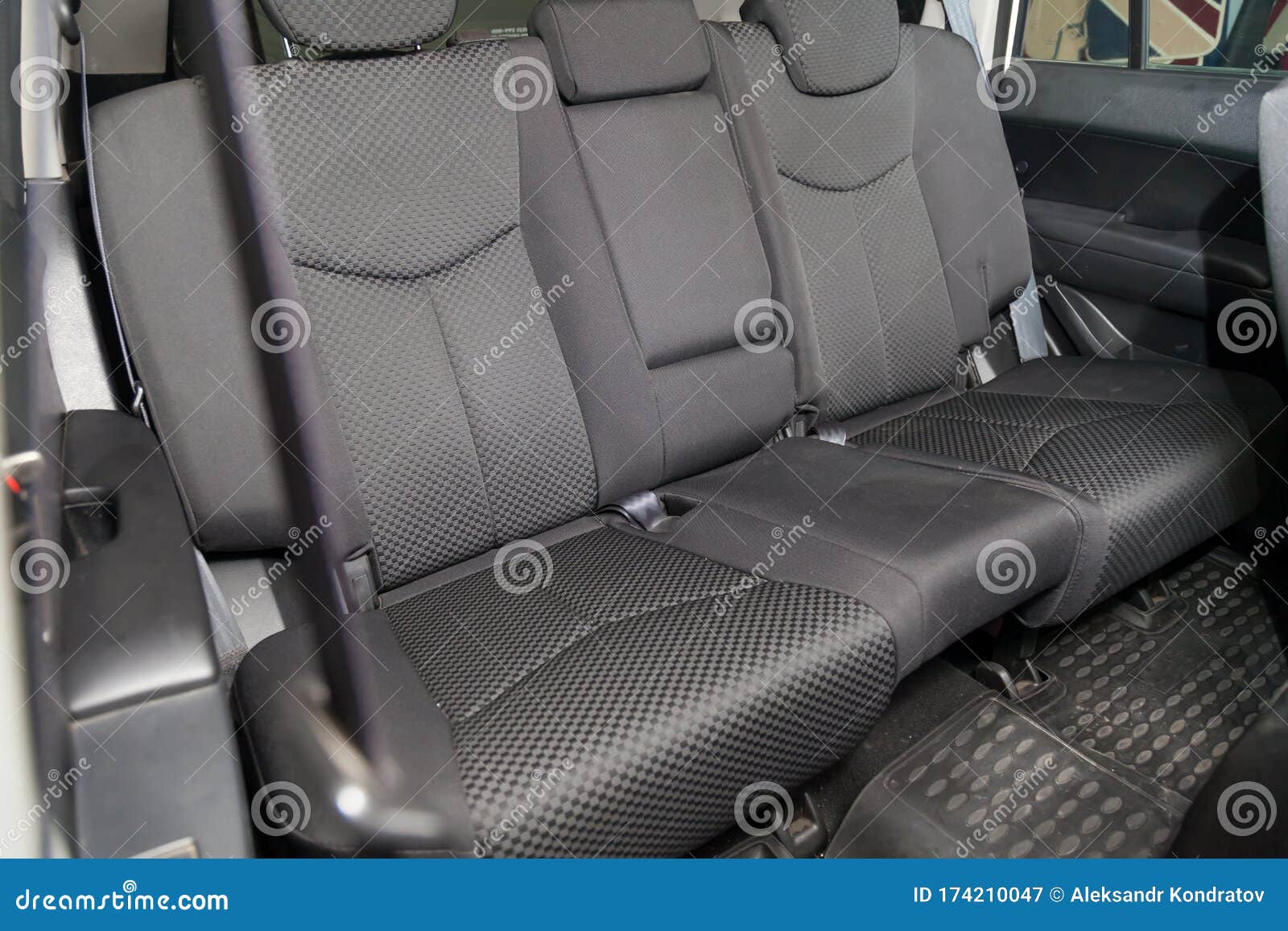 Close Up Aon Rear Seats With Velours Fabric Upholstery In The