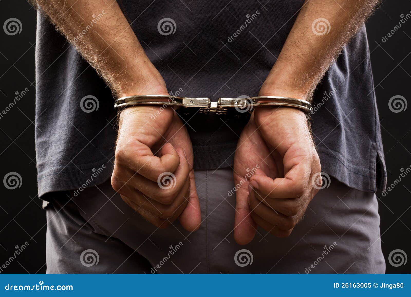 close-up. arrested man handcuffed