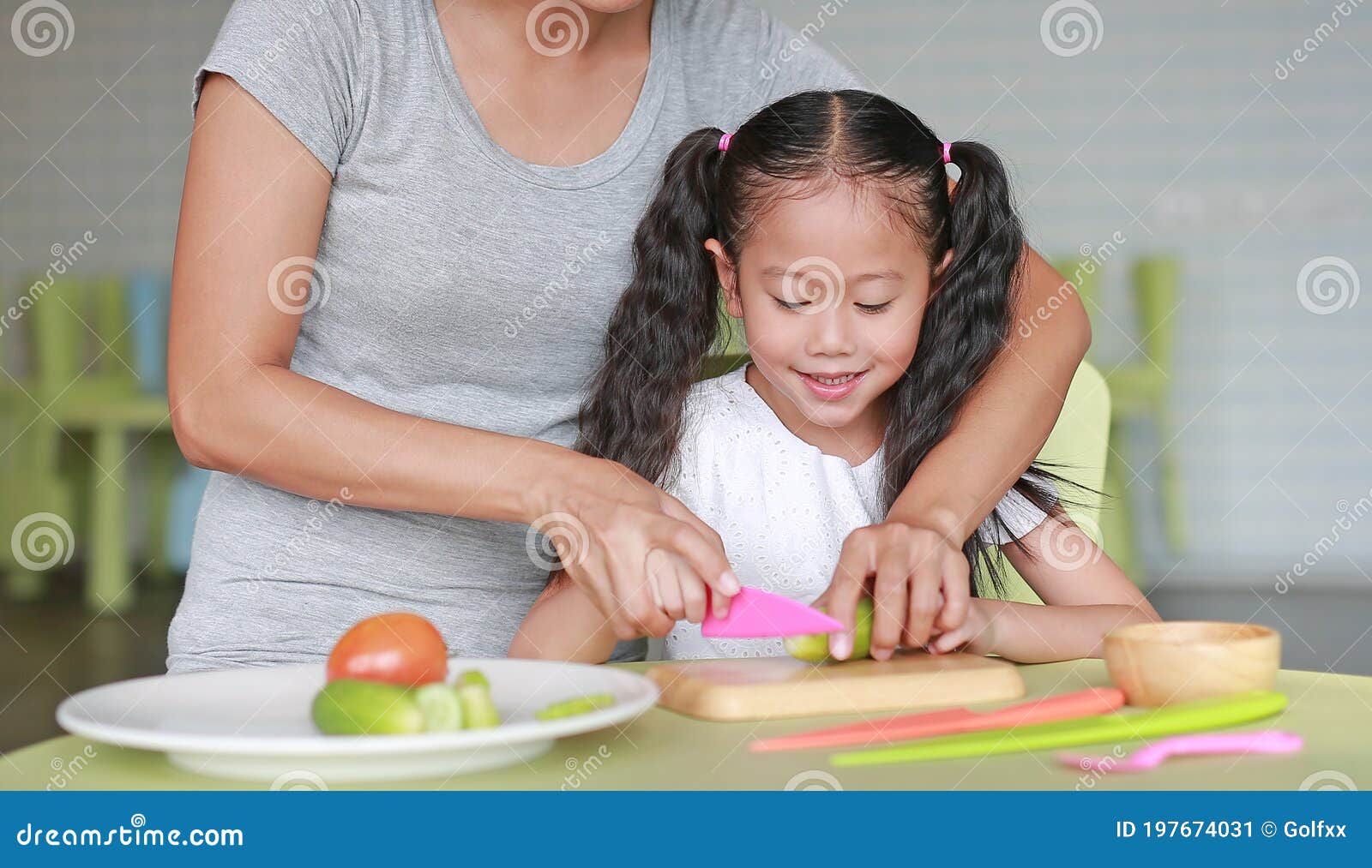 asian mom teaches daughter