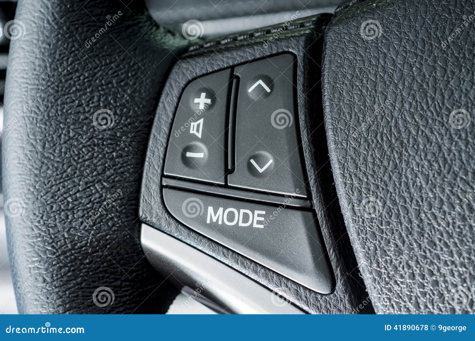 Close Up of Audio Control Knob on a Steering Wheel Stock Photo Image