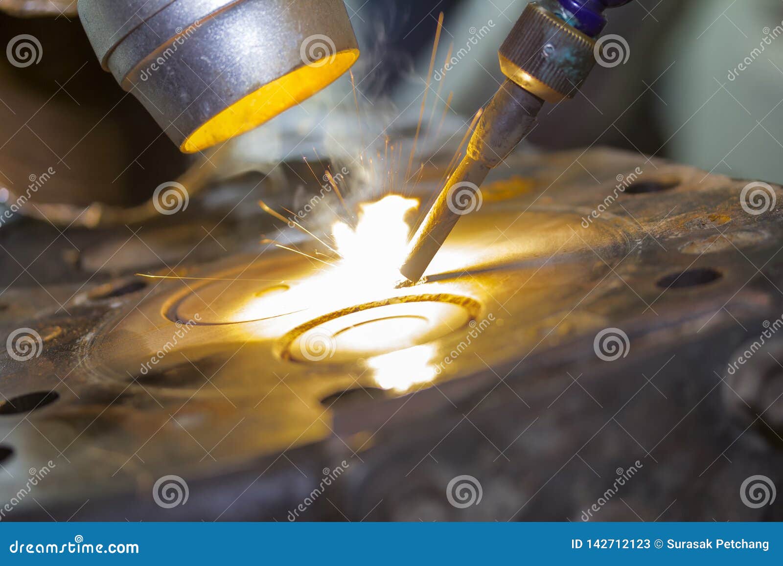 Close Up Automobile Engine Head Cylinder Repair or Modify by Welder with Laser Welding Method