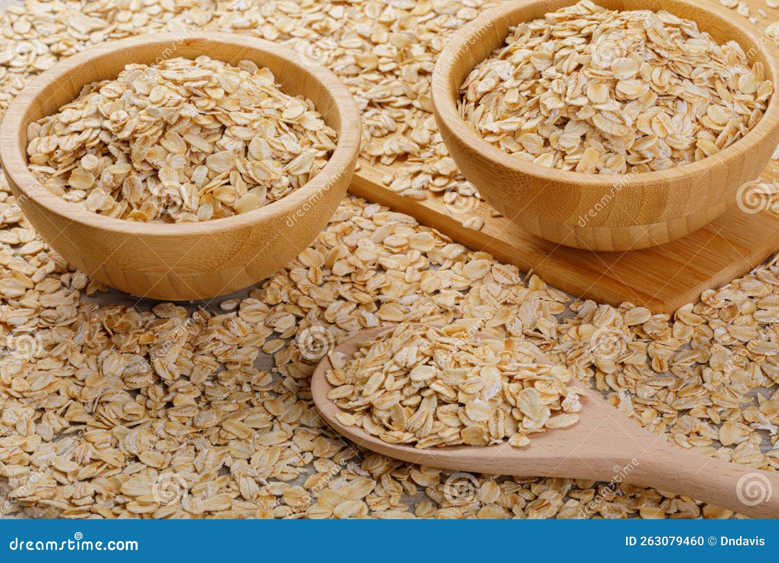 Close Up of a Background of Whole Grain Rolled Oats Stock Photo Image