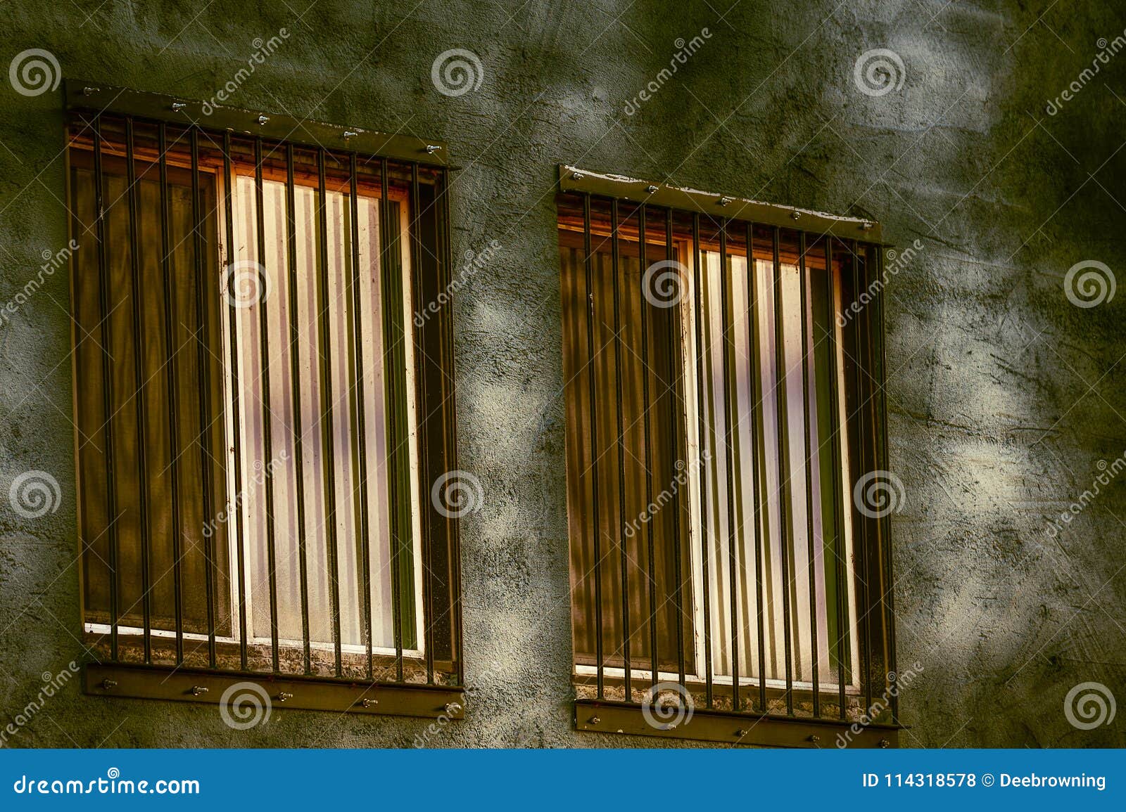close up of barbed windows reflecting sunlight