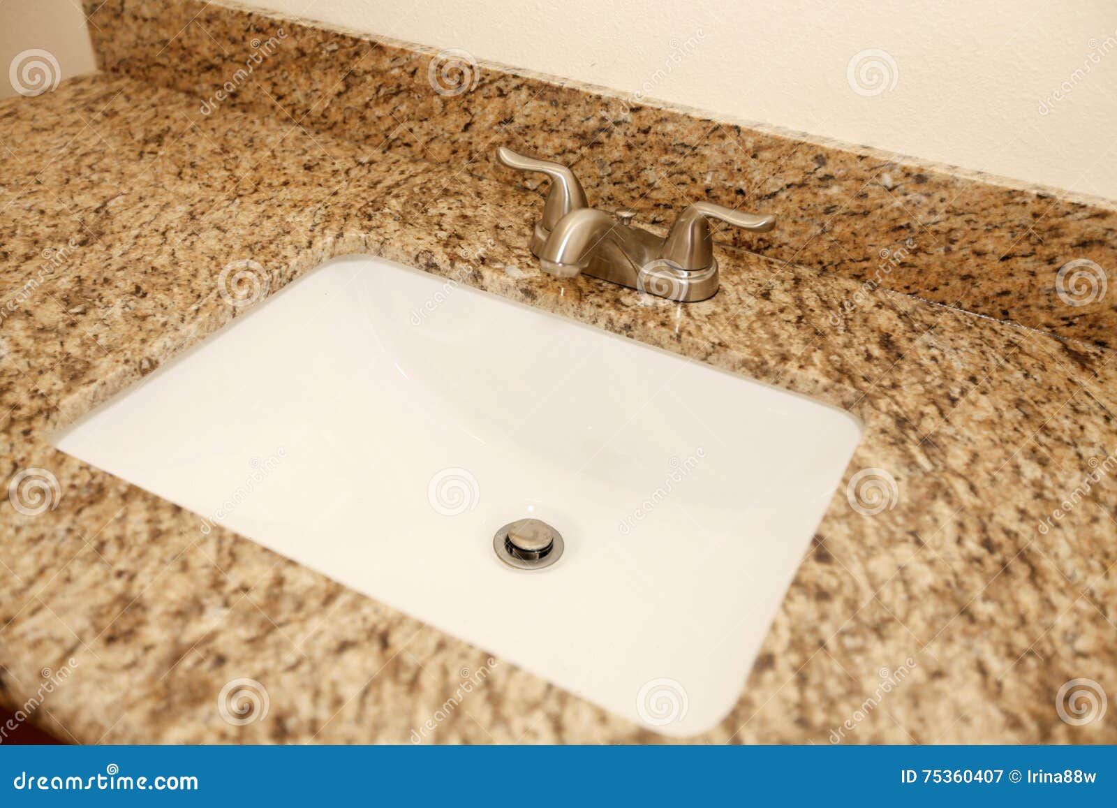 Close Up Of The Bathroom Sink And Granite Counter Top Stock Image