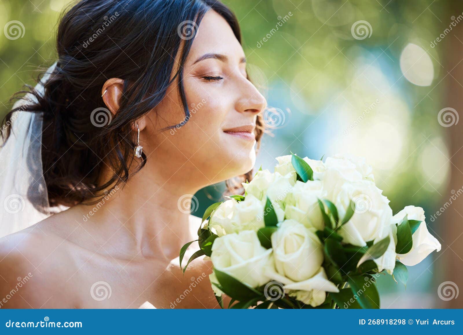 Close Up of a Beautiful Bride Smelling Her Wedding Bouquet.Tender Bride ...