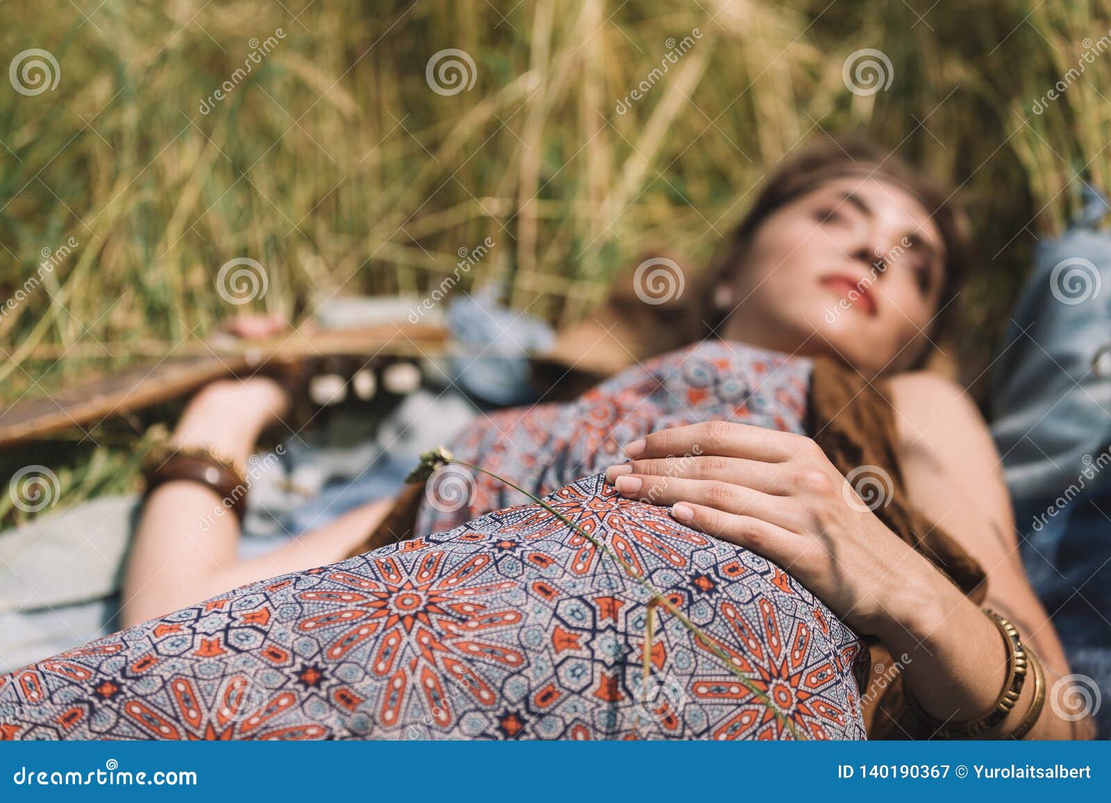 Beautiful Hippie Woman Sleeping on the Grass. Stock Image - Image of ...