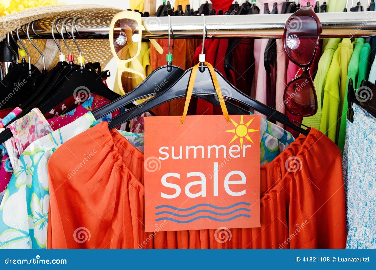 Close Up on a Big Sale Sign for Summer Clothes. Stock Photo