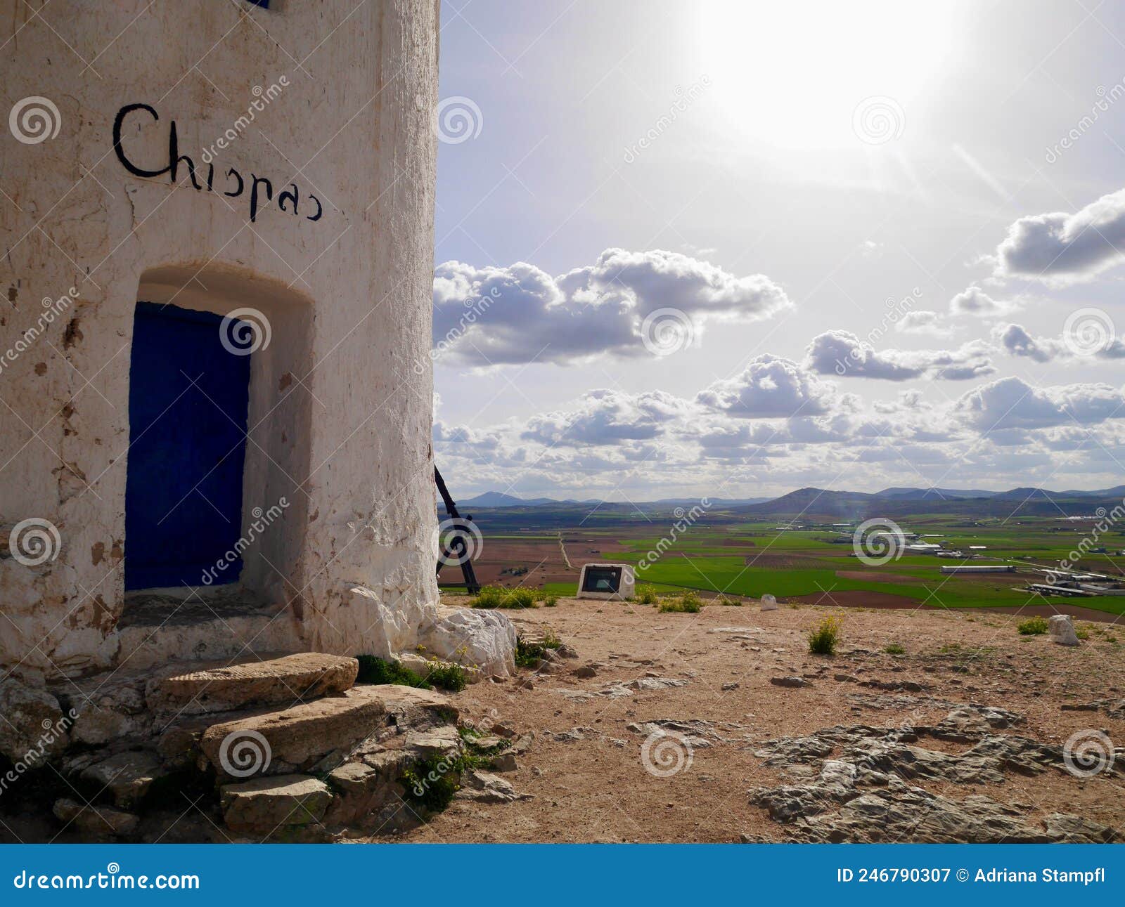 close up of blue entrance door of chispas windmill in consuegra, castile la mancha, spain.