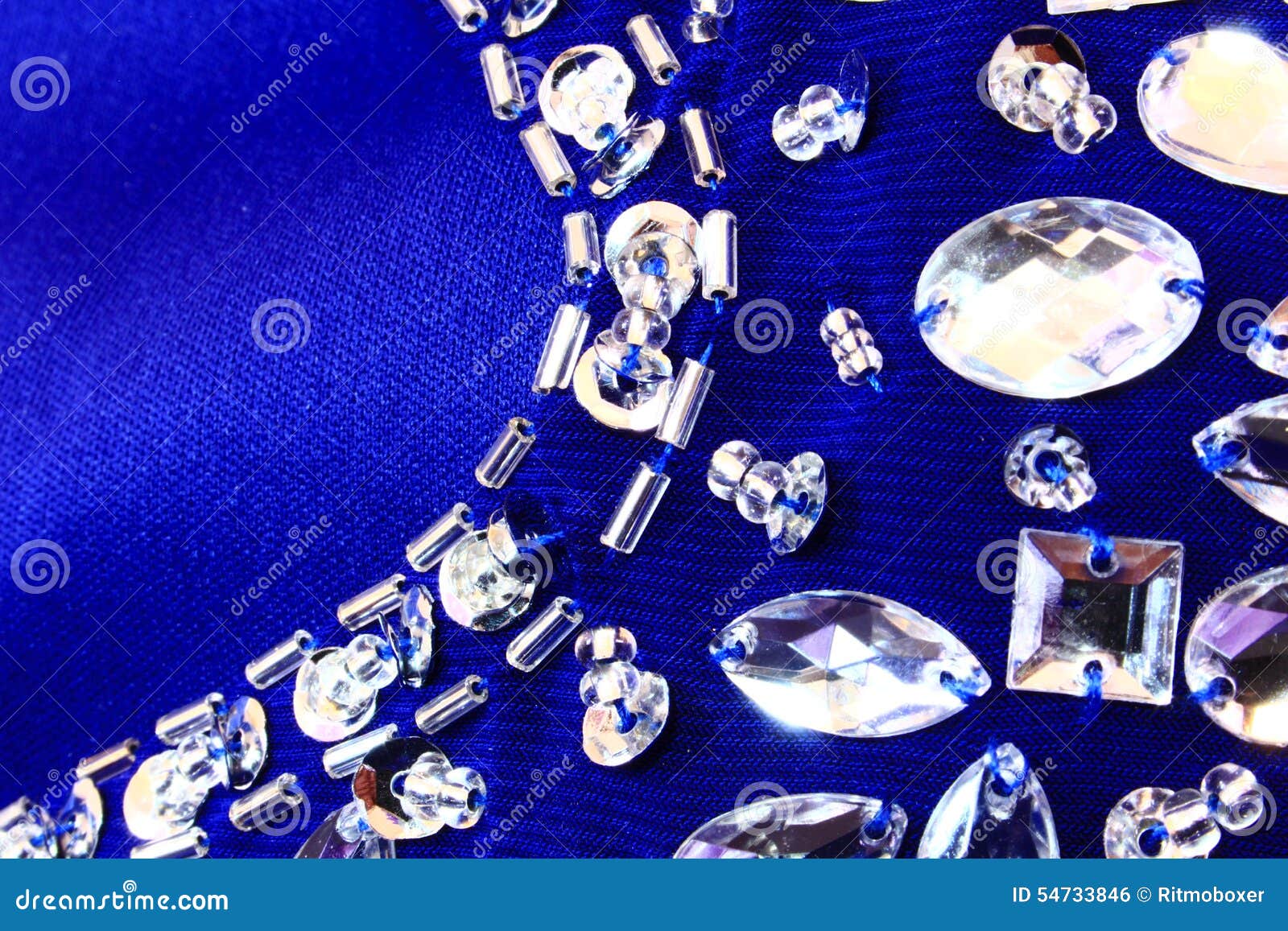 Close Up of Blue Fabric with Sequins and Rhinestones Stock Photo