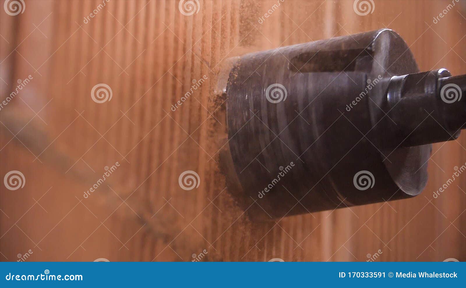 Close Up of Boring Hole Process in Wall for Electric Outlet by Power