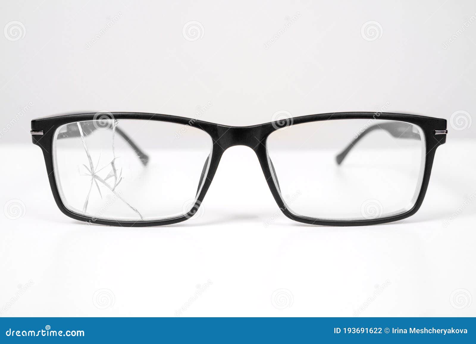 Close Up Of Broken Black Glasses On A White Background. Vision ...