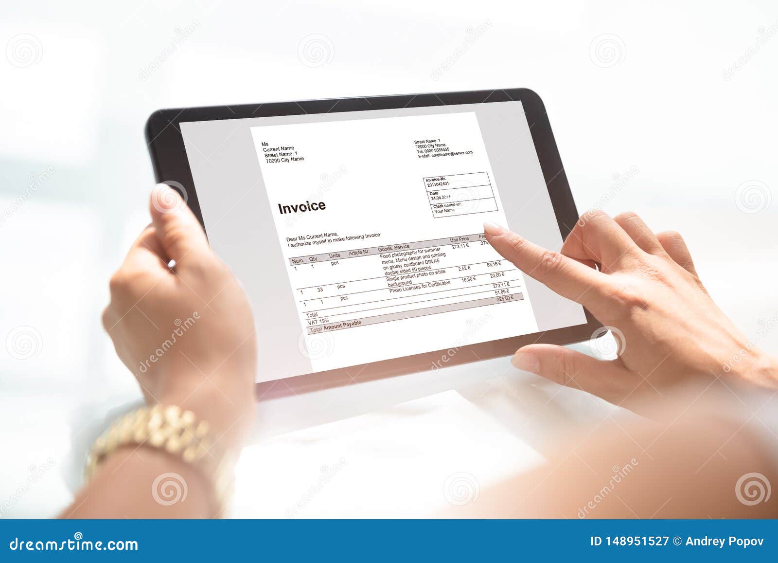 businesswoman checking invoice on digital tablet