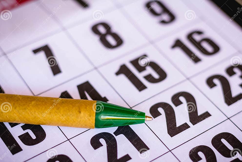 Close Up on Calendar Numbers Concept of Tax Rate, Expiration Date and