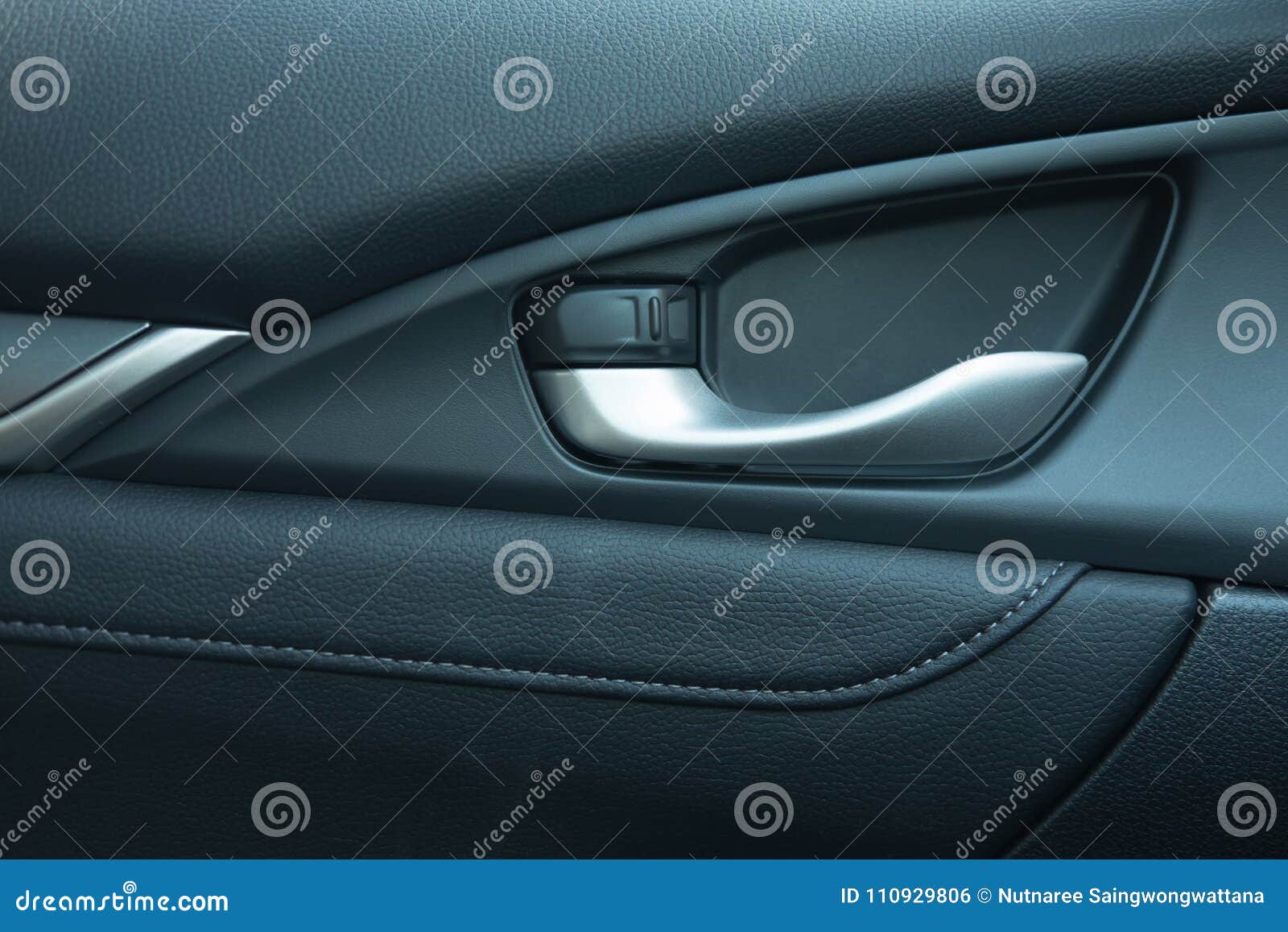 Close Up Car Leather Interior Detail Of Door Handle And