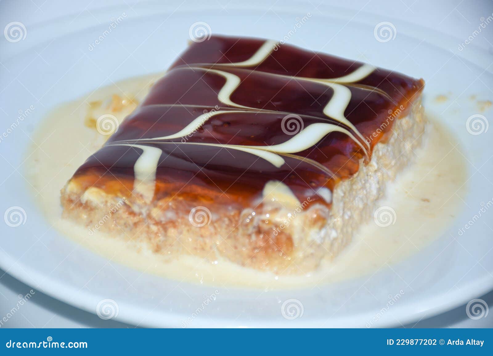 Close Up of Caramel Trilece, Turkish Dessert Served on Plate Stock