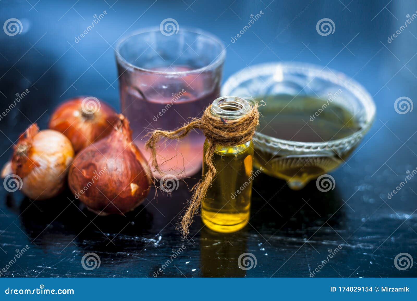 Close Up of Caster Oil,onion Juice Mixture Used To Make Hair Stronger and  Thicker on Wooden Surface Stock Photo - Image of massage, cepa: 174029154