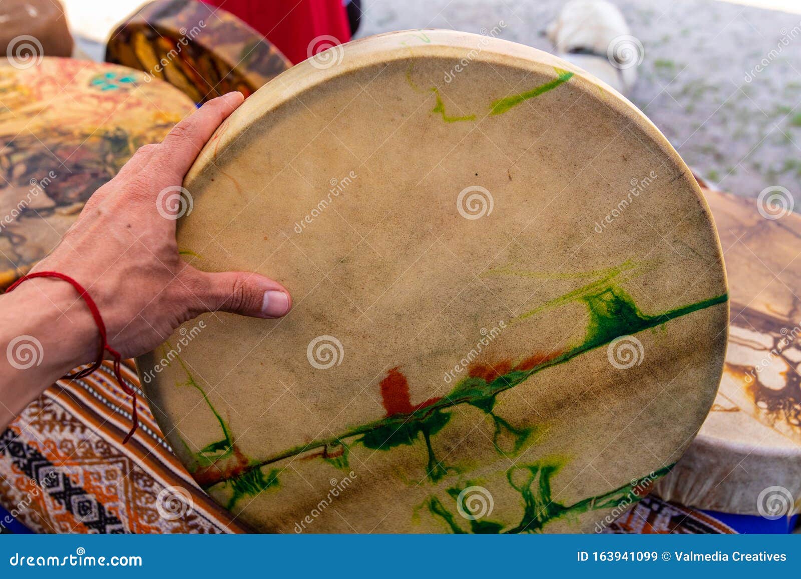 Closeup of Hand Holding a Colourful Drum Stock Image - Image of healers ...