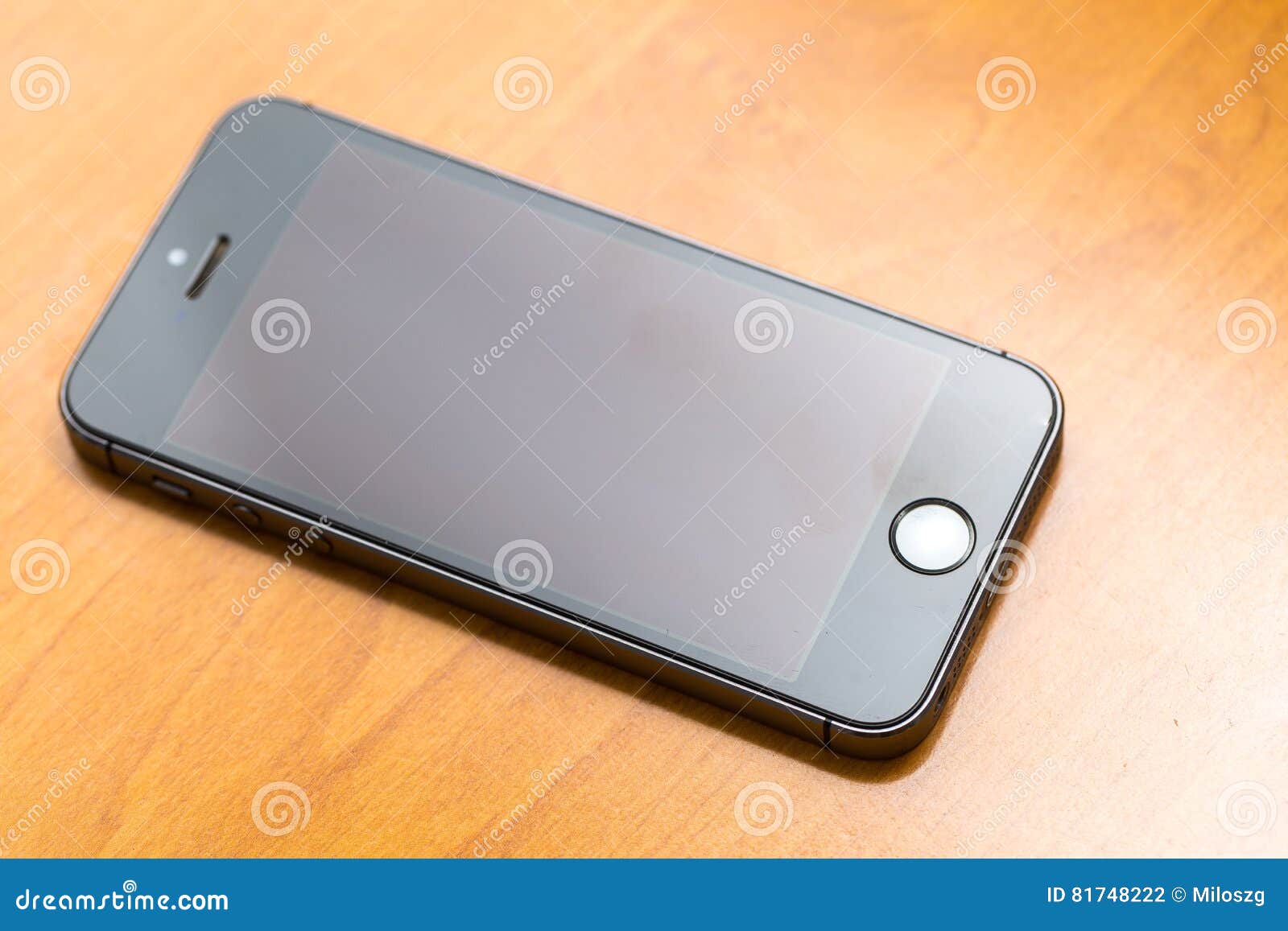 Close Up of Cellphone Lying on Wooden Table Stock Photo Image of