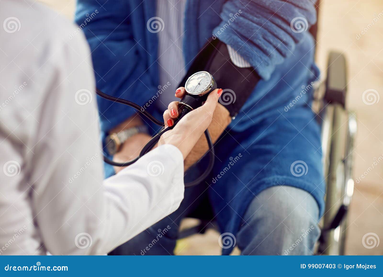 close up checking the hypertension assessment of blood pressure