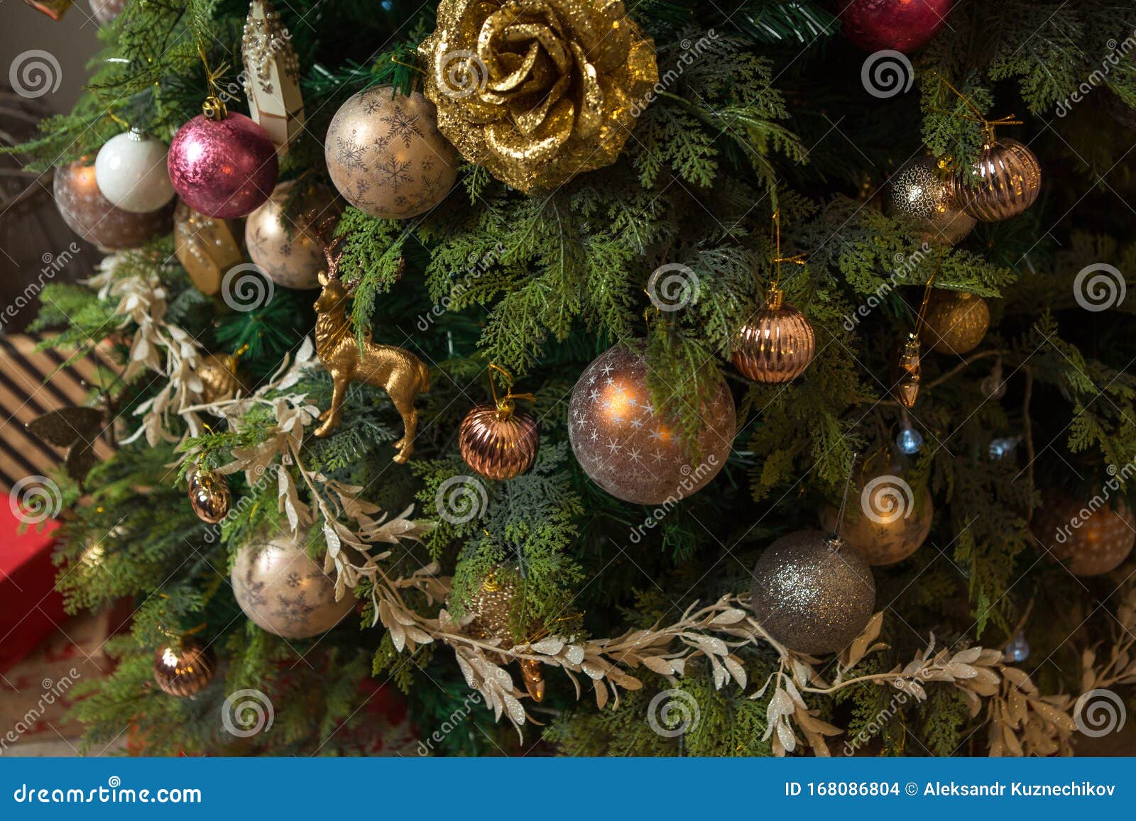 Closeup of Christmas Decorations Hung on a Christmas Tree Stock Photo