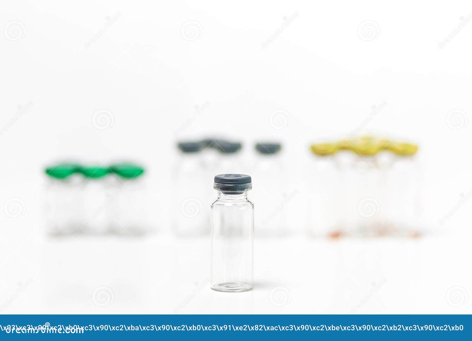 Closeup of Clean and Empty Medical Vials with Caps Isolated on White