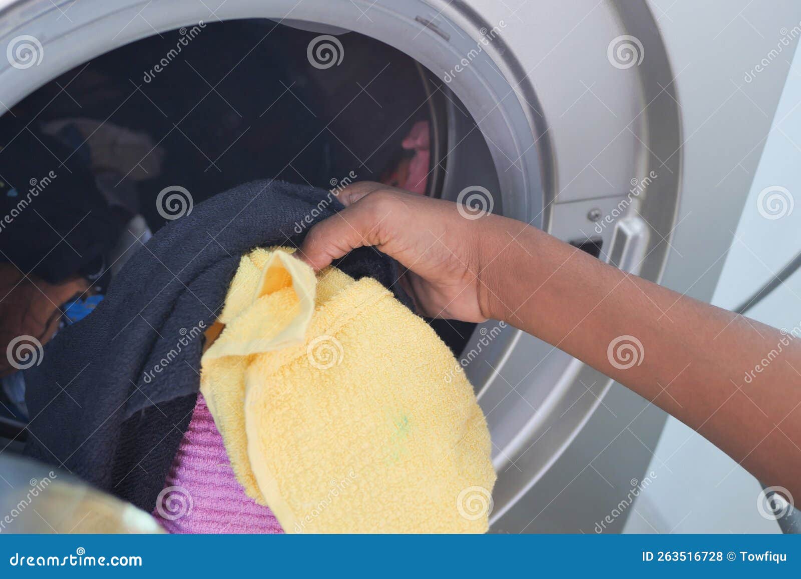 Close Up of Cloths in a Washing Machine. Stock Photo Image of health