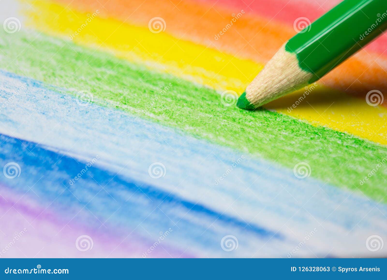 Close Up of a Colored Pencil Drawing a Colorful Rainbow Stock