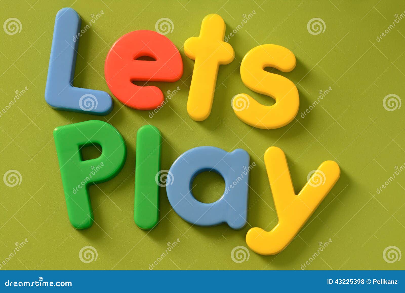 Close Up Of Colorful Lets Play Words On Green Back Stock Photo Image Of Horizontal Arranged