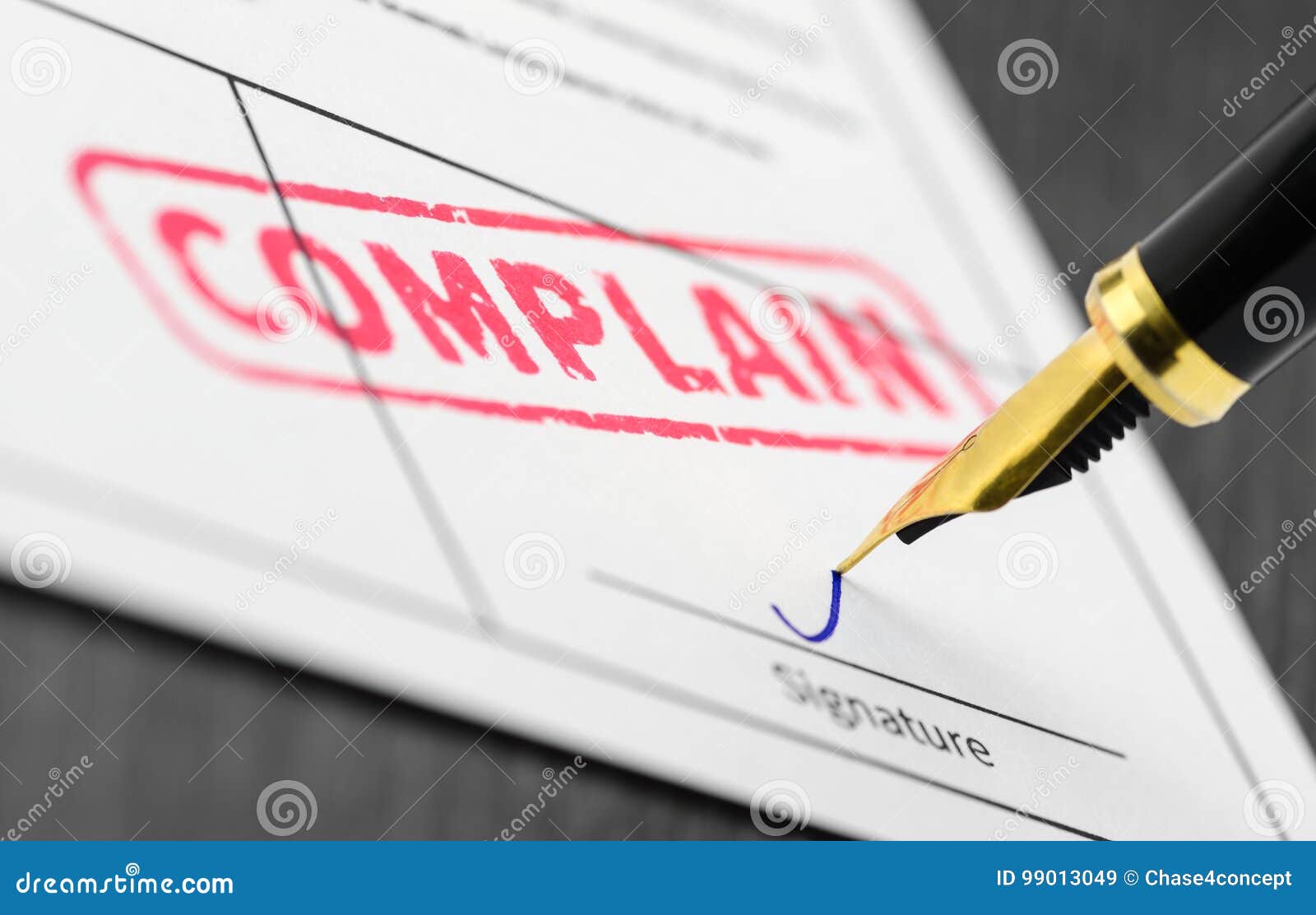 close up of complain stamp on a document.