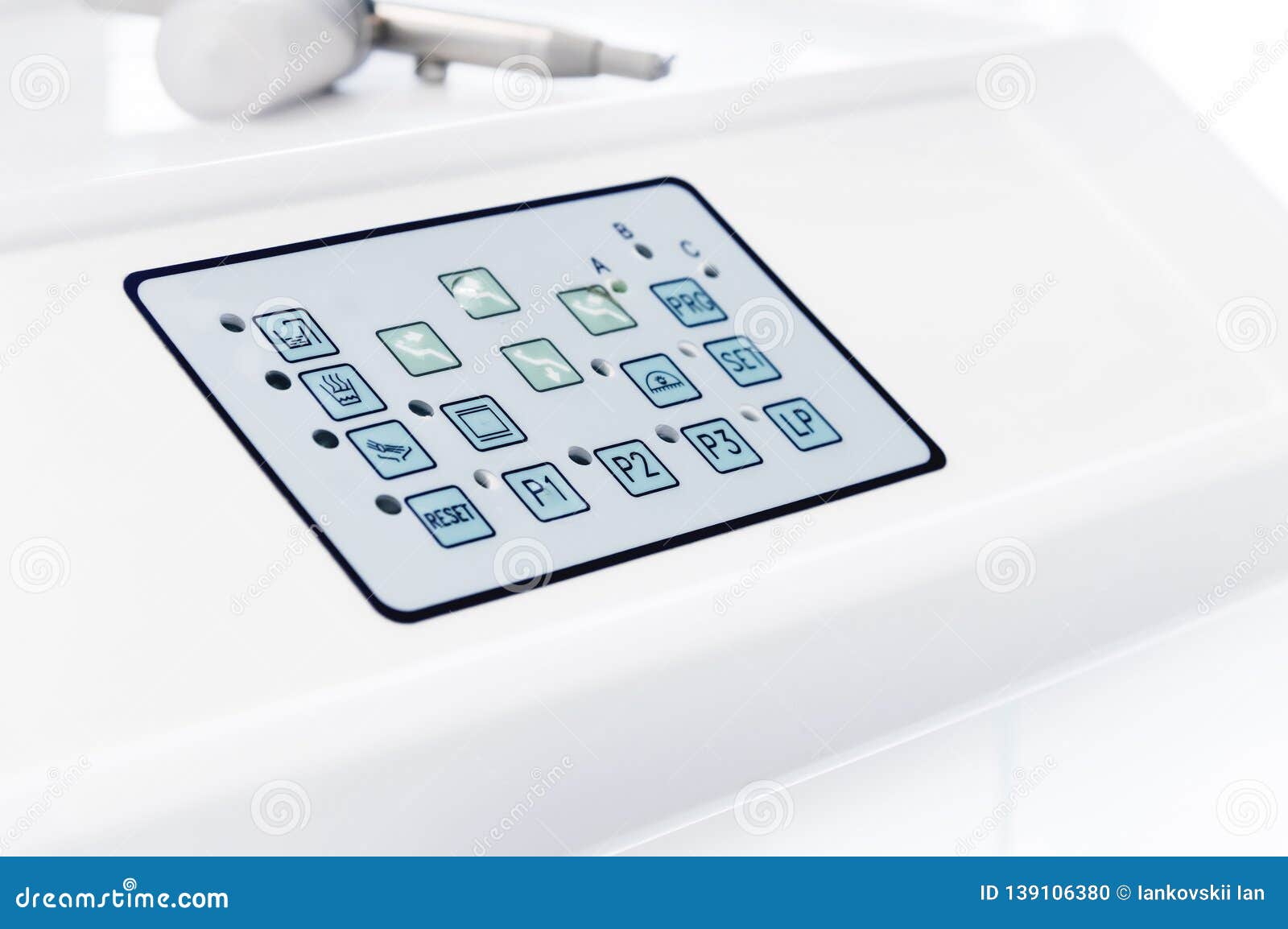Closeup of the Control Panel with Buttons on the Dental Chair Stock