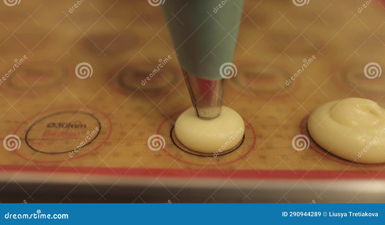 Closeup of a Cooking Syringe that Squeezes the Cream Onto the Surface