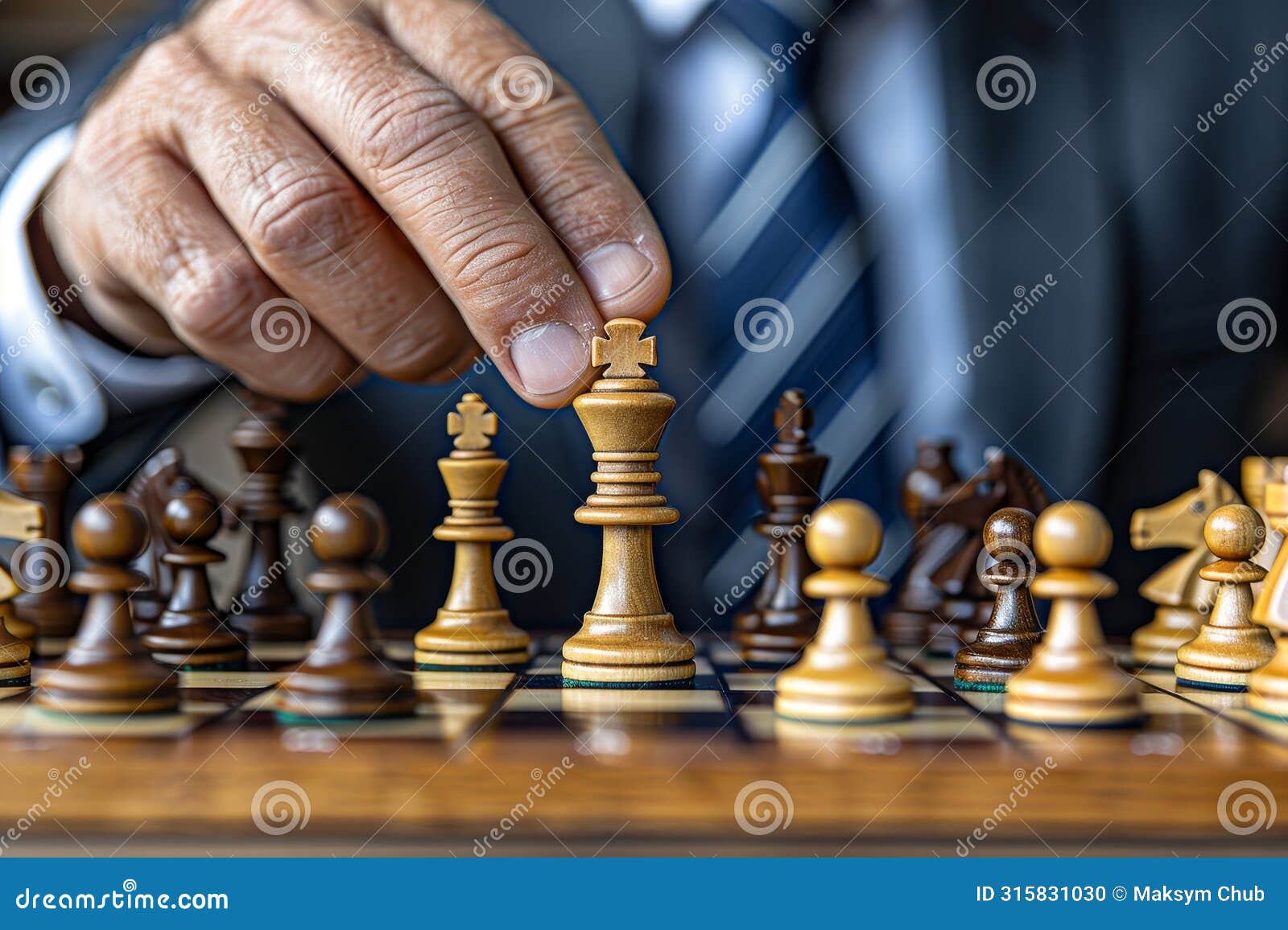 close up of corporate strategist strategically placing chess pieces for business planning