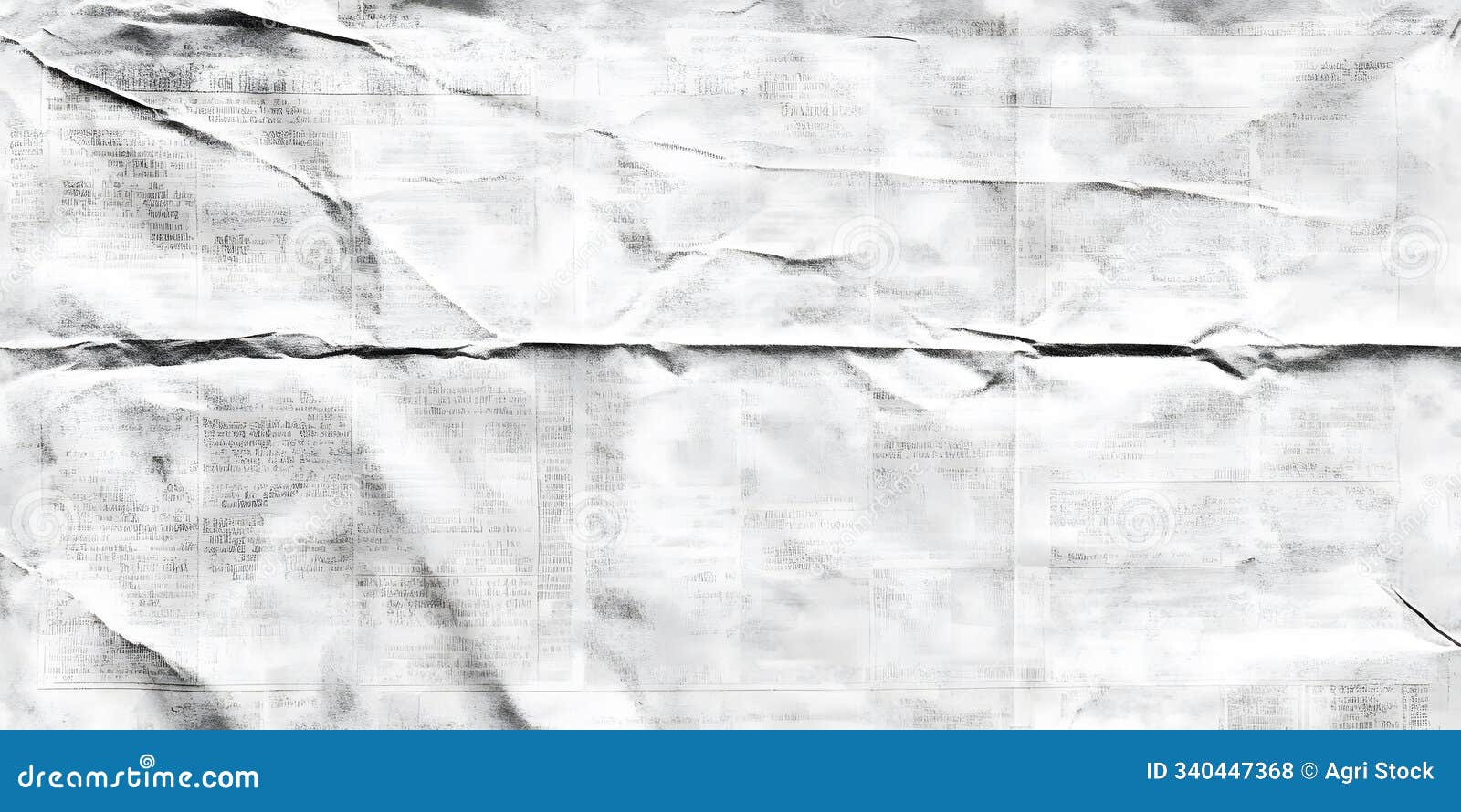 a close-up of crumpled white paper with indecipherable text