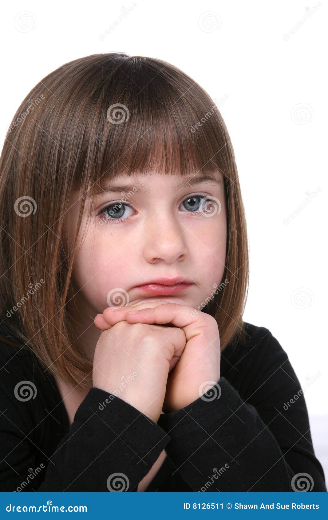 Premium Photo Child girl sad profile face close up with hands on