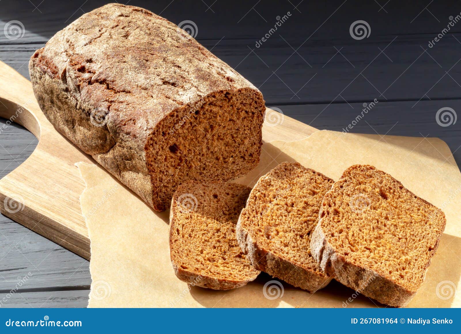 Bread with Slices on Parchment Paper Close Up Stock Photo - Image of grey,  crunchy: 267081964