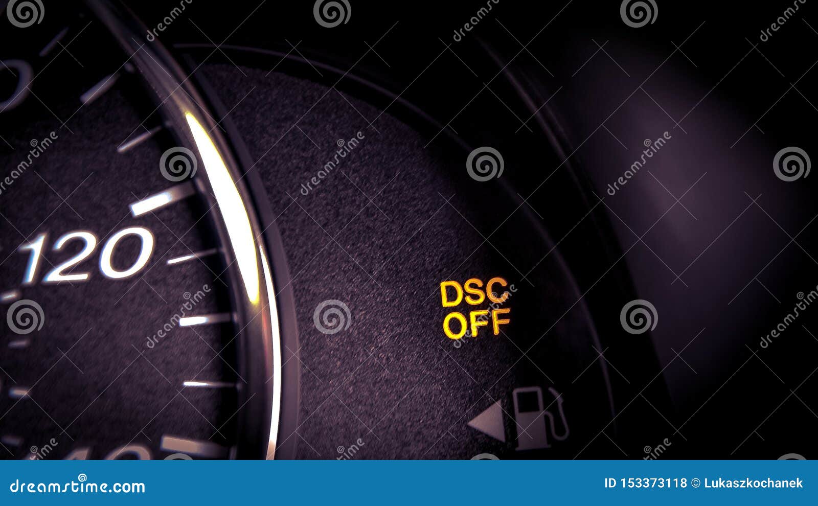 close-up dashboard with dsc off warning light on