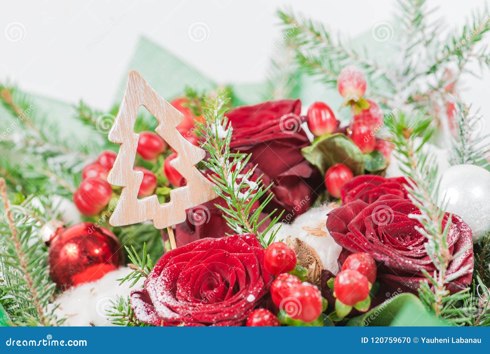 Close-up of Decorative Christmas Tree in a Bouquet of Red Rose, Stock ...